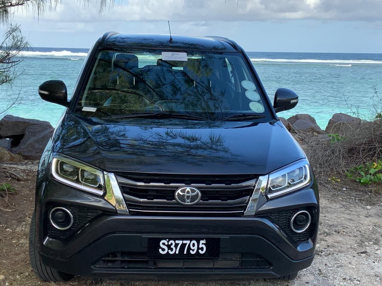 Dark grey Toyota Urban Cruiser by the sea on Mahé